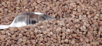 buckwheat background and teaspoon