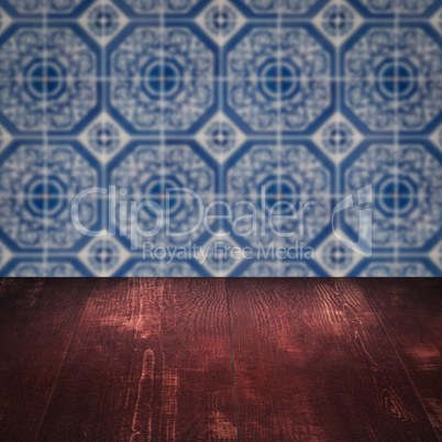 Wood table top and blur vintage ceramic tile pattern wall