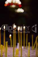 Lighted candles in church