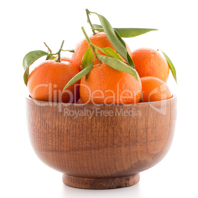 Tangerines on wooden  bowl