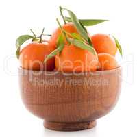 Tangerines on wooden  bowl