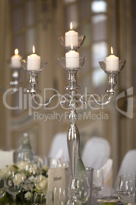 Candles at a laid table