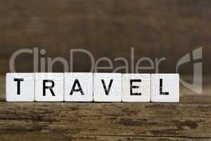 The word travel written in cubes