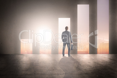 Composite image of businessman standing with his briefcase Composite image of businessman standing with his briefcase