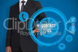 Composite image of businessman pointing
