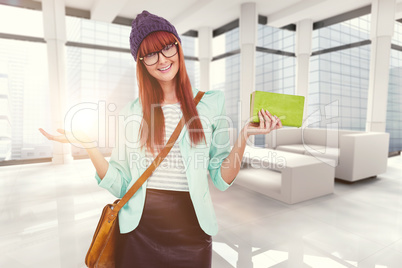 Composite image of smiling hipster woman with bag and book