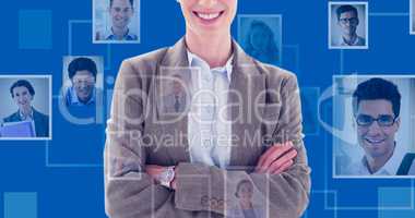 Composite image of happy businesswoman standing arms crossed