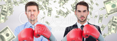 Composite image of businessman with boxing gloves