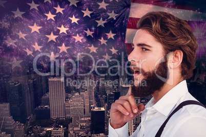 Composite image of thoughtful hipster with finger on chin