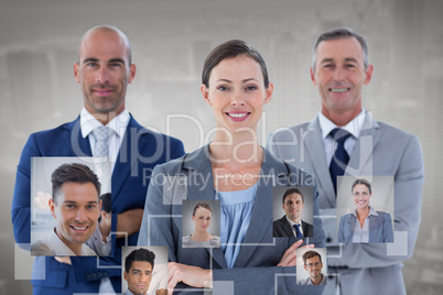 Composite image of business colleagues smiling at camera