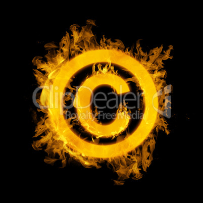 Composite image of copywrite logo in fire
