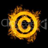 Composite image of copywrite logo in fire