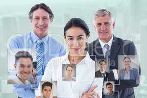 Composite image of smiling business people brainstorming togethe