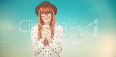 Composite image of smiling hipster woman drinking coffee