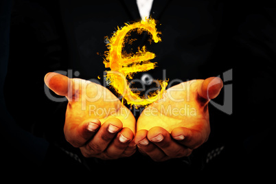 Composite image of businessman holding his hands out