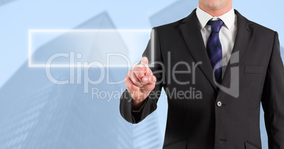 Composite image of businessman in suit pointing finger