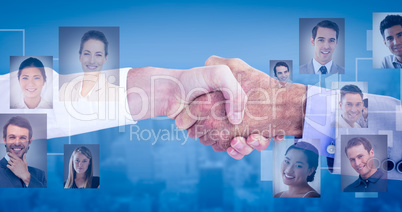 Composite image of business people shaking hands on white backgr