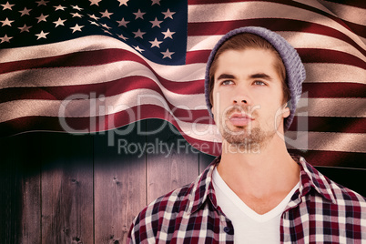 Composite image of confident hipster looking away