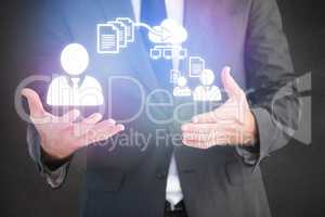 Composite image of handsome businessman presenting with hands