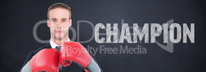 Composite image of businessman with boxing gloves