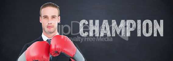 Composite image of businessman with boxing gloves