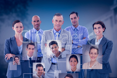 Composite image of business team working happily together on lap