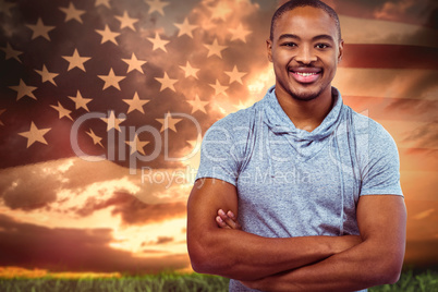Composite image of smiling man with arm crossed on white backgro