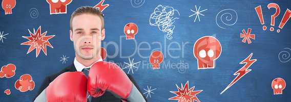 Composite image of businessman with boxing gloves