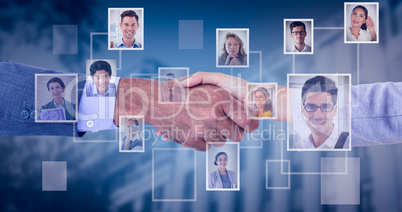 Composite image of business people shaking hands on white backgr