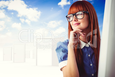 Composite image of attractive smiling hipster woman thinking