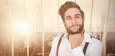 Composite image of confident hipster with hand on chin