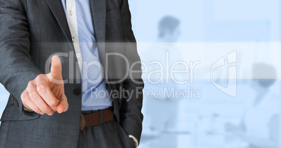 Composite image of businessman in grey suit pointing