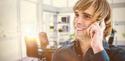 Composite image of hipster businessman talking on the phone