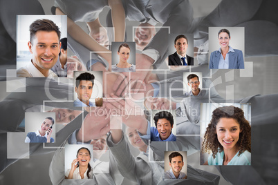 Composite image of smiling business team standing in circle hand