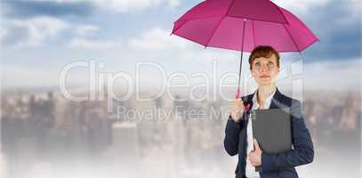 Composite image of businesswoman with umbrella