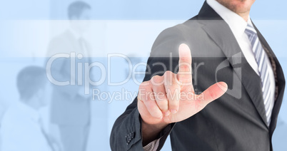 Composite image of businessman pointing with his finger