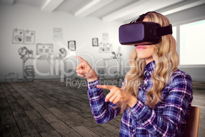 Composite image of pretty casual worker using oculus rift