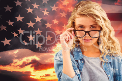 Composite image of portrait of businesswoman wearing eyeglasses