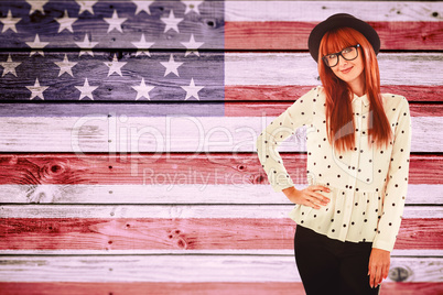 Composite image of portrait of a smiling hipster woman