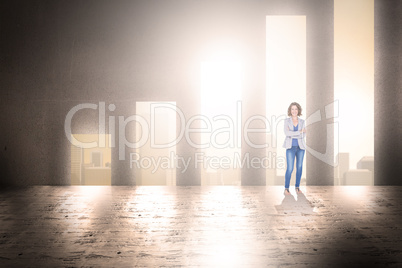Composite image of businesswoman looking at camera with arms cro