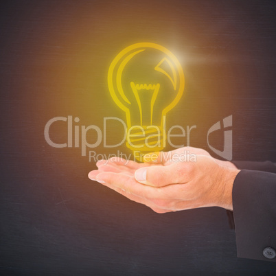 Composite image of businessman holding his hands out