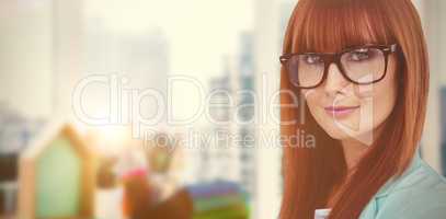Composite image of portrait of a smiling hipster woman