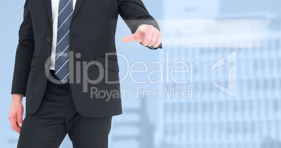 Composite image of mid section businessman pointing with his fin