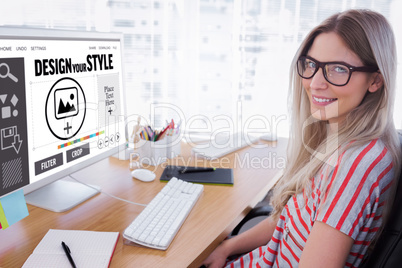 Composite image of attractive photo editor working on computer