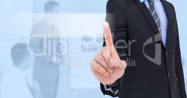 Composite image of mid section of businessman pointing something