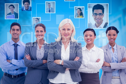 Composite image of business people with arms crossed smiling at