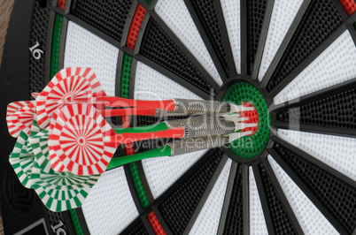 Dart board with darts