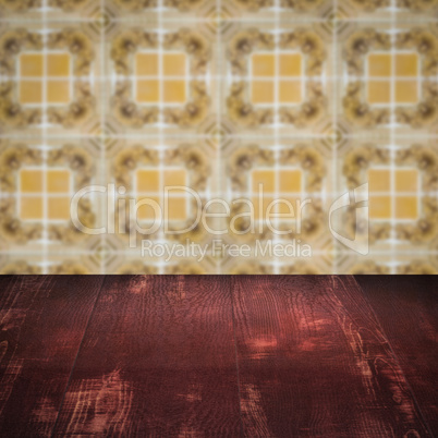 Wood table top and blur vintage ceramic tile pattern wall Wood table top and blur vintage ceramic tile pattern wall