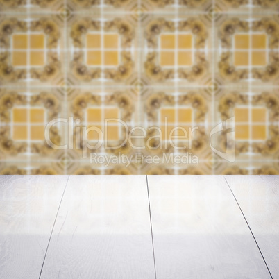 Wood table top and blur vintage ceramic tile pattern wall Wood table top and blur vintage ceramic tile pattern wall