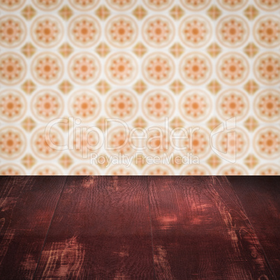 Wood table top and blur vintage ceramic tile pattern wall Wood table top and blur vintage ceramic tile pattern wall